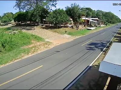 Biker smashes head-on into pickup truck and flips into the back.