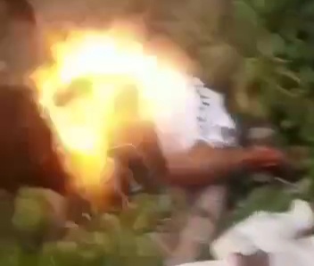 The execution of two Nigerian man by BLACK AXE GANG in forest