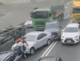 Green truck lost control crashed two motorcyclists between cars 