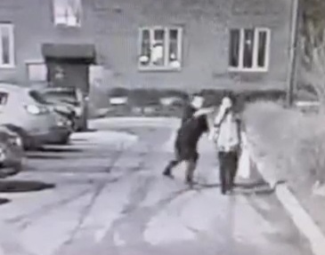 Lunatic Throws Acid at a random Lady.