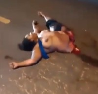 Woman Split by Truck on the Road.