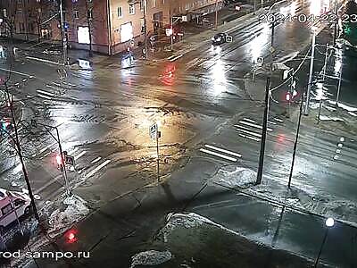 Drunk driver with a stolen car runs a red light and hits another car