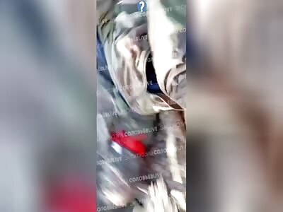 Russians record the results of a Ukrainian trench cleanup