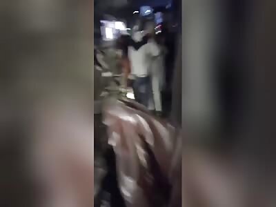woman run over in street fight