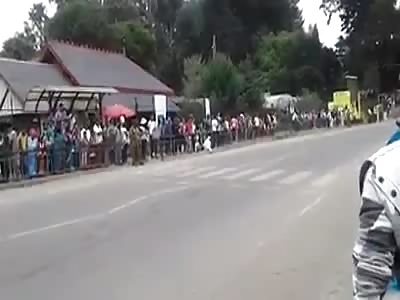 Biker Skids and Crashes into the Crowd During Race