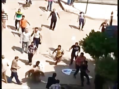 Man Brutally Beaten by Mob in the Street