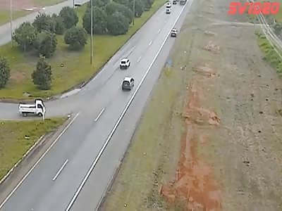 Suicide. Brazilian Cop Parks the Car on Side of Highway and Then Dives Under Passing Truck