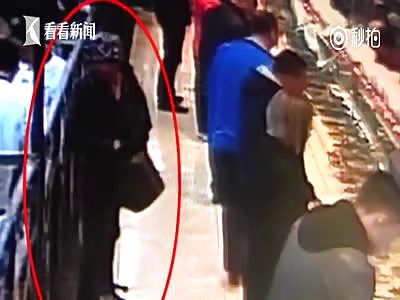 Crazy Man Stabs Unsuspecting Customer with 2 Knives 