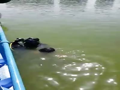 Recovering Body of Young Man from River