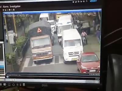 Woman on Scooter Getting Run Over by Truck 