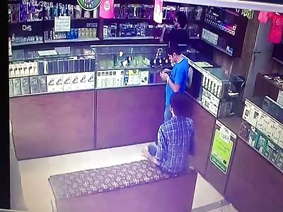 Cigarette Lighter Ignites Gas Leak Explosion inside Mobile Shop