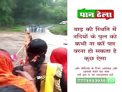 Man Getting Washed Away by Flood Water