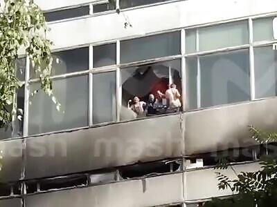Moaning Russian Employees Jump Burning Building—Ext. Karma Clip