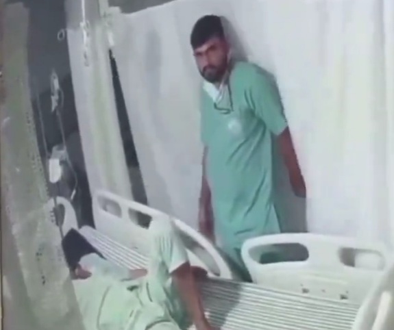 Indian doctor abusing old man