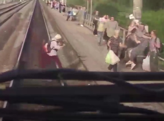 84 years old Russian woman not fast enough for crossing train track 