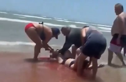 Four Sharks Turn 4th of July Party on a Beach into a Bloodbath