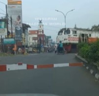 Indonesian Biker Killed By Train.