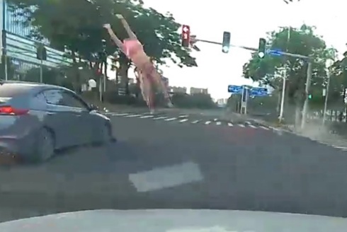 Female Pedestrian Flying like a Rag Doll 