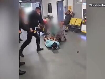 Police kicking someone in the head