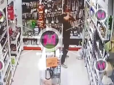 Crazy Dude Stabs Himself In Store