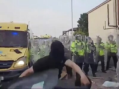 Protester in England Gets Brick to the Head and Balls