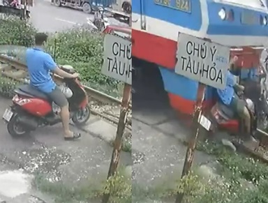 Watch The Horrific Moment When Distracted Motorcyclist is Annihilated by Train