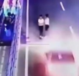 Woman Gets Catapulted Out of Existence By Oncoming Car