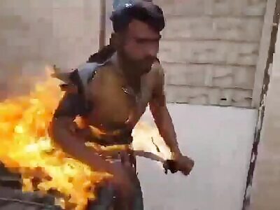 Self Immolation In Front Of Crowd