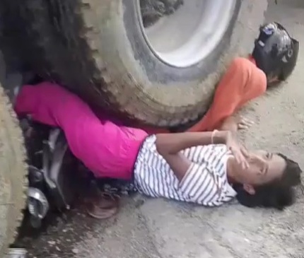 Haitian Woman Crushed & Alive under Big Truck...Husband Dead.