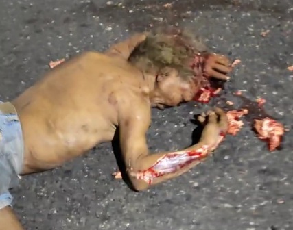 Old man gored by big loaded truck 