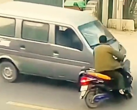 WHOA: Motorcyclist Crashed by Speeding Car.