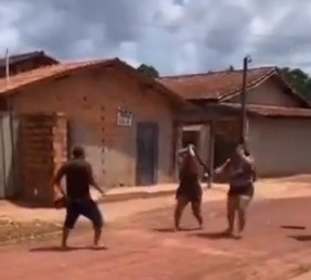 Old man Holding Machete Defend Himself Against Two loud mouth bitches 