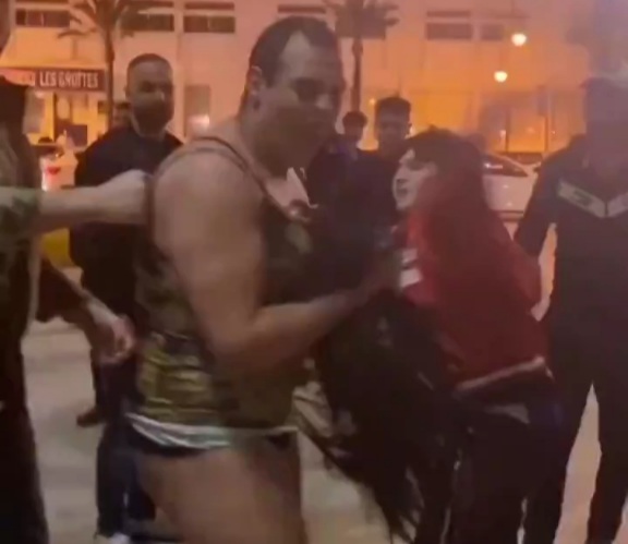 Beating the shit out of transgender in algeria  