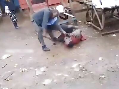 person being hacked with a machete