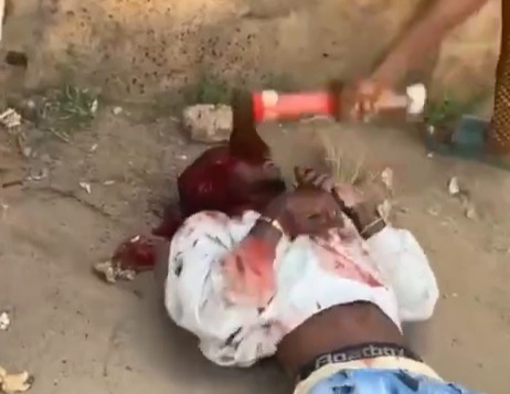 BLACK AXE GANG MEMBER BUTCHERING RIVAL WITH AXE 
