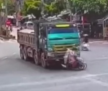 Father and Son Rolled by Truck