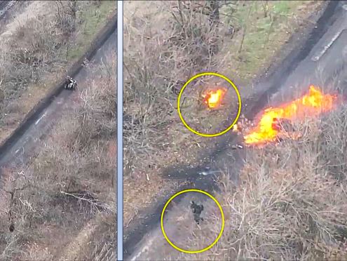 Bike + Sidecar Hits Mine, Engulfed Russian Runs Amock