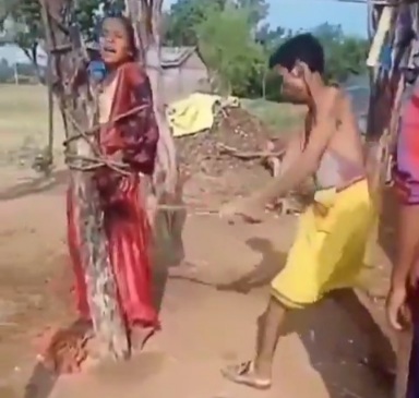 Indian husband tied his wife into a pole and savagely whip her 