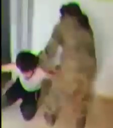 Execution of Two Regime Soldiers by Rebels 