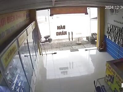 Pedestrian walking down the road is run over and crushed by truck. 