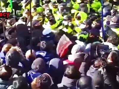 Female Cop in Coma after being hit in the head by walkie-talkie.