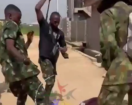 Nigerian soldier beating the shit out of a viking gang member 