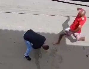 Drunk man gets a hard kick to the face 