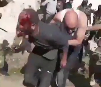 Syrian Regime soldier captured and tortured by rebels 