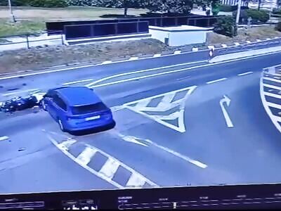 Biker hit car, dies.