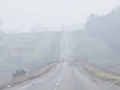 Russiansoldier on a motorcycle falls off due to the lack of experience