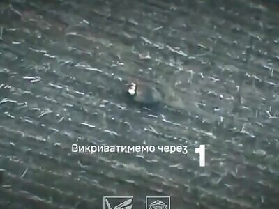 Russian soldier crawled with a thermal blanket on his back.