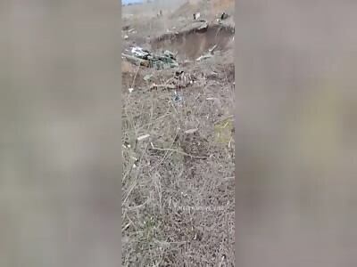 RU POV: Dead crew of a Russian tank.