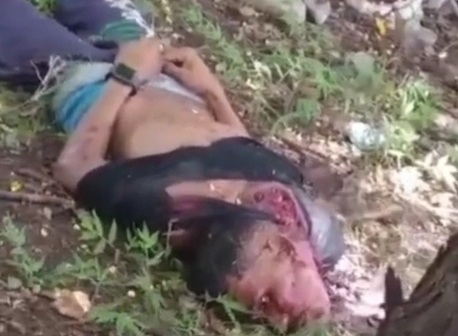 Beheaded Dead body of young man with dumped in a side road 