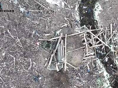 precise throwing into a trench at a group of Ukrainians